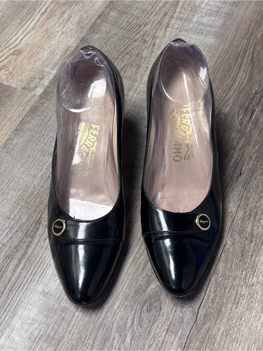 Salvatore Ferragamo Black Patent Leather Old Money Pumps with Gold Logo Accent